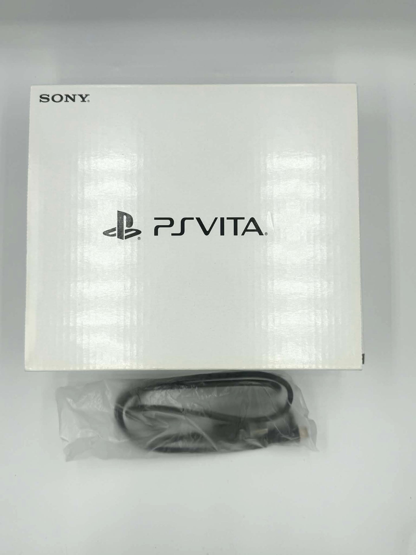 Sony PS Vita 2000 – Pack Rouge et Noir (Complet) 