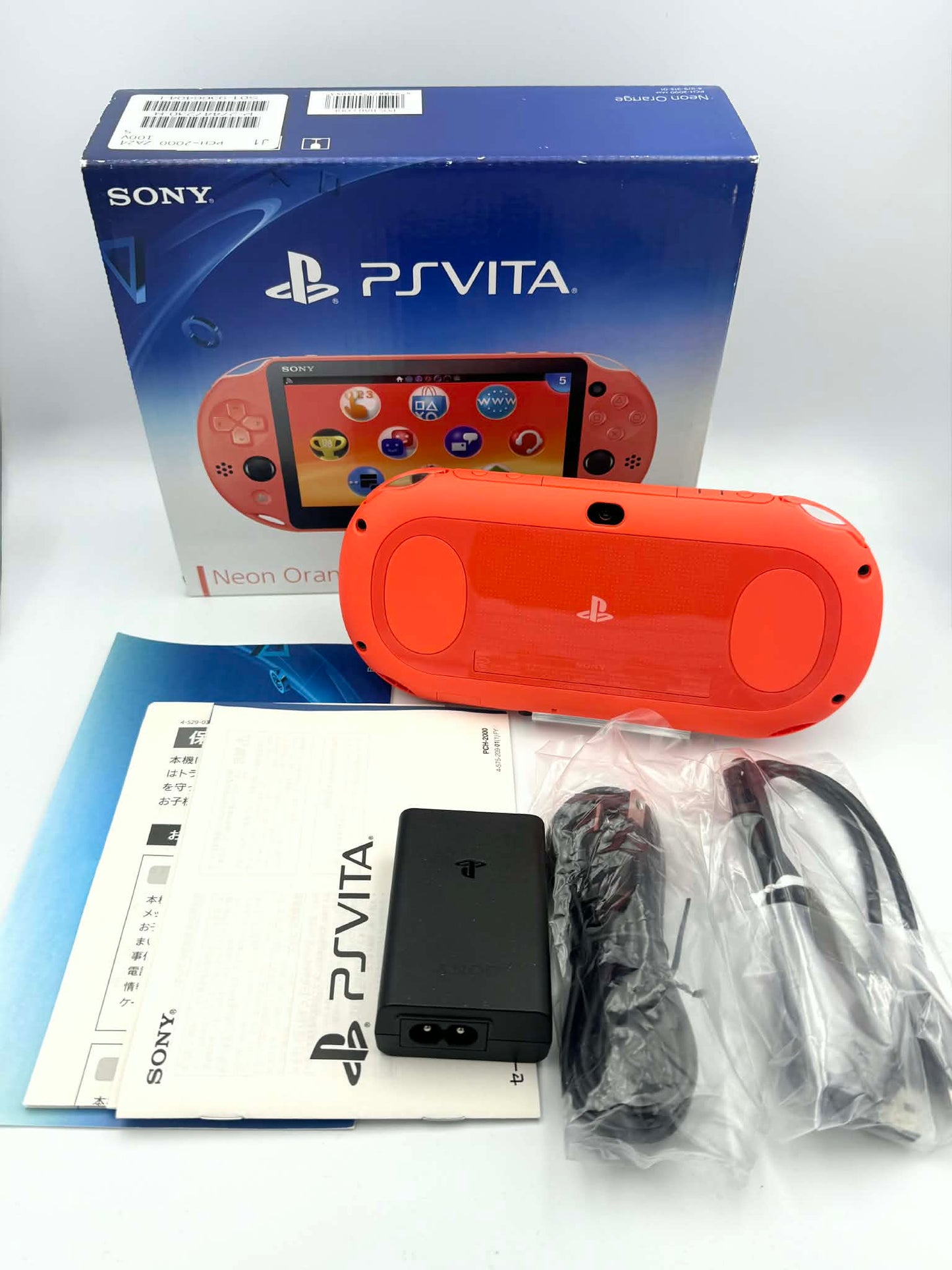 PS Vita 2000 – Neon Orange (Complete in Box)